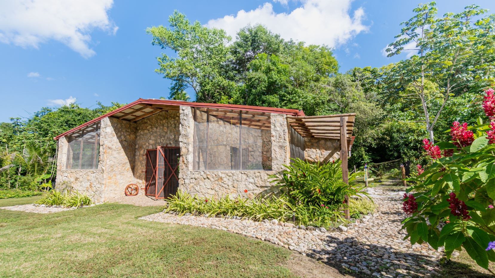 Featured image 4235 – Spectacular Off-Grid Mayan Retreat with Two Stone Buildings + 2 Acres of Land + Pond near San Ignacio Town, Cayo District, Belize