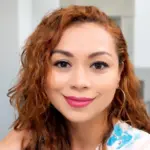 Portrait of REMAX Belize Real Estate Agent, Nubia Reynoso