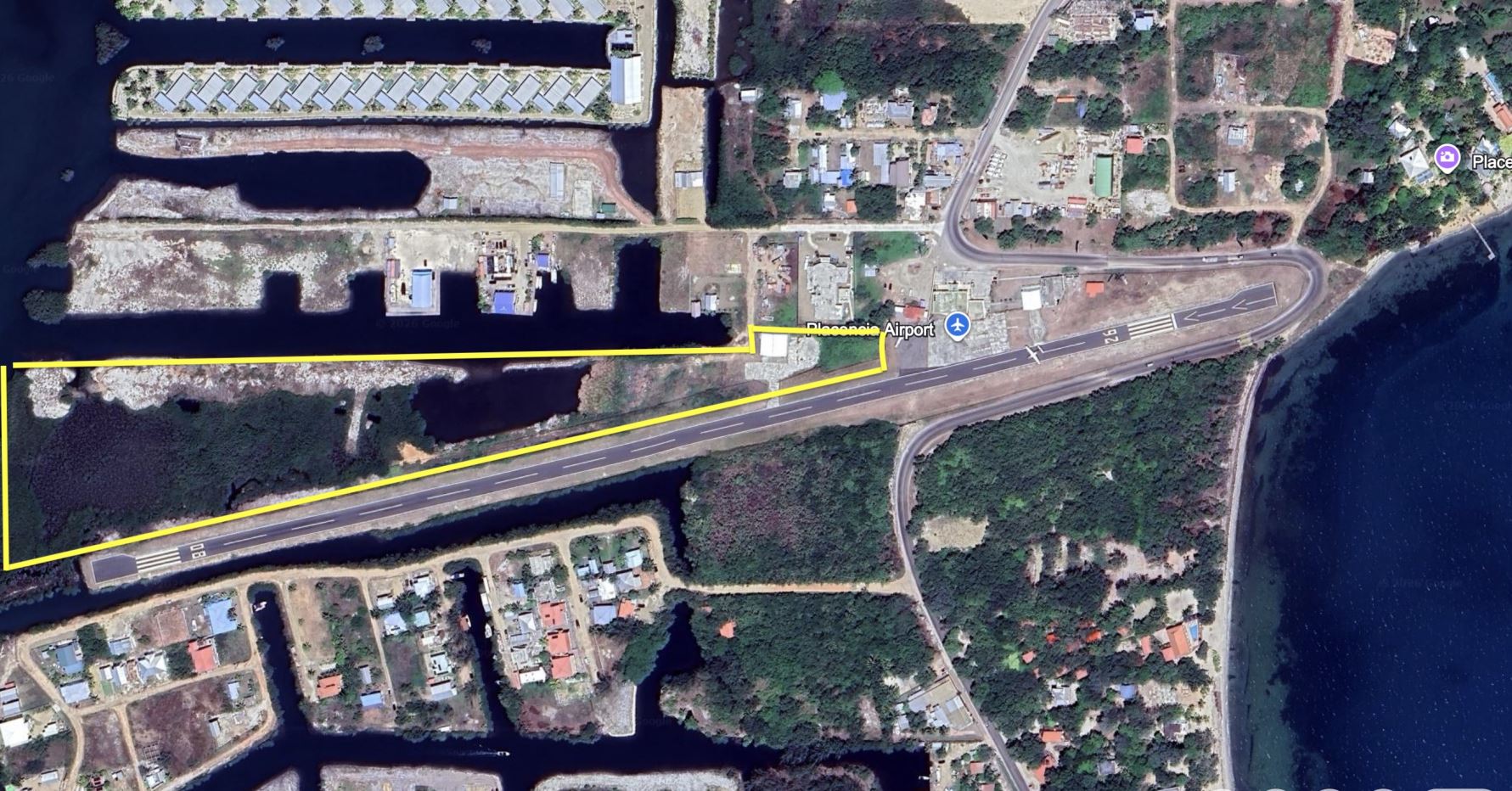 Featured image of property LAND, SEA AND AIR ACCESS. Runway access for hangars – 10 Acres WATERFRONT at Placencia Harbor Docks Marina – Listing 4502
