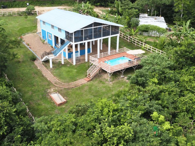 Featured image of property Belize Real Estate: Newly Built Home with Pool, Fruit Trees, and Stunning Views in Bullet Tree Falls