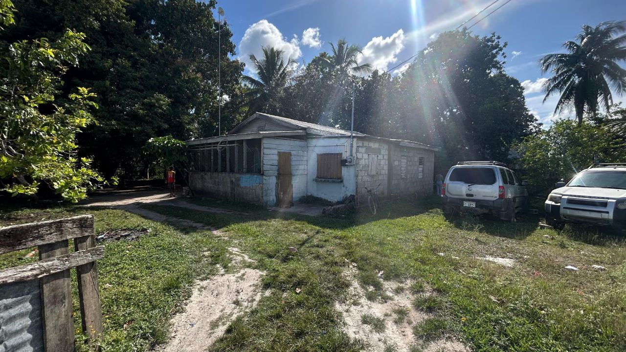 Featured image of property Listing 3003 – Corner Lot Fixer-Upper with Two Structures – Carmelita Village, Orange Walk District
